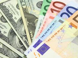 Cambio Euro Dollaro previsioni e scontri Trump Draghi
